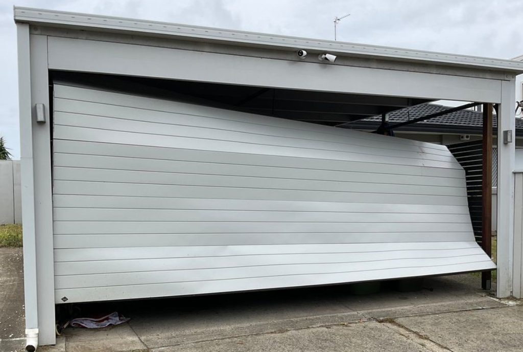 Broken panelift garage door